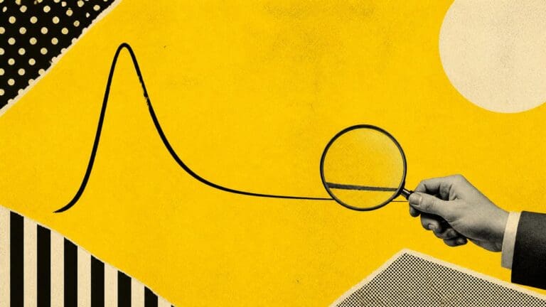 A hand holds a magnifying glass over the long tail of a search-demand curve, on yellow.