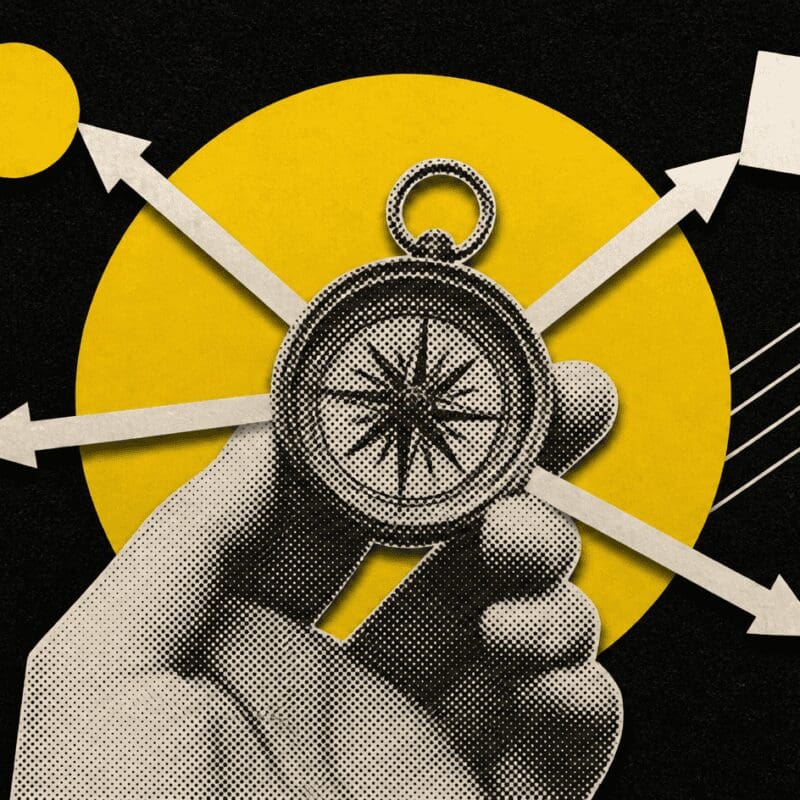 A hand holds a compass with arrows pointing four ways to different shapes, on black.