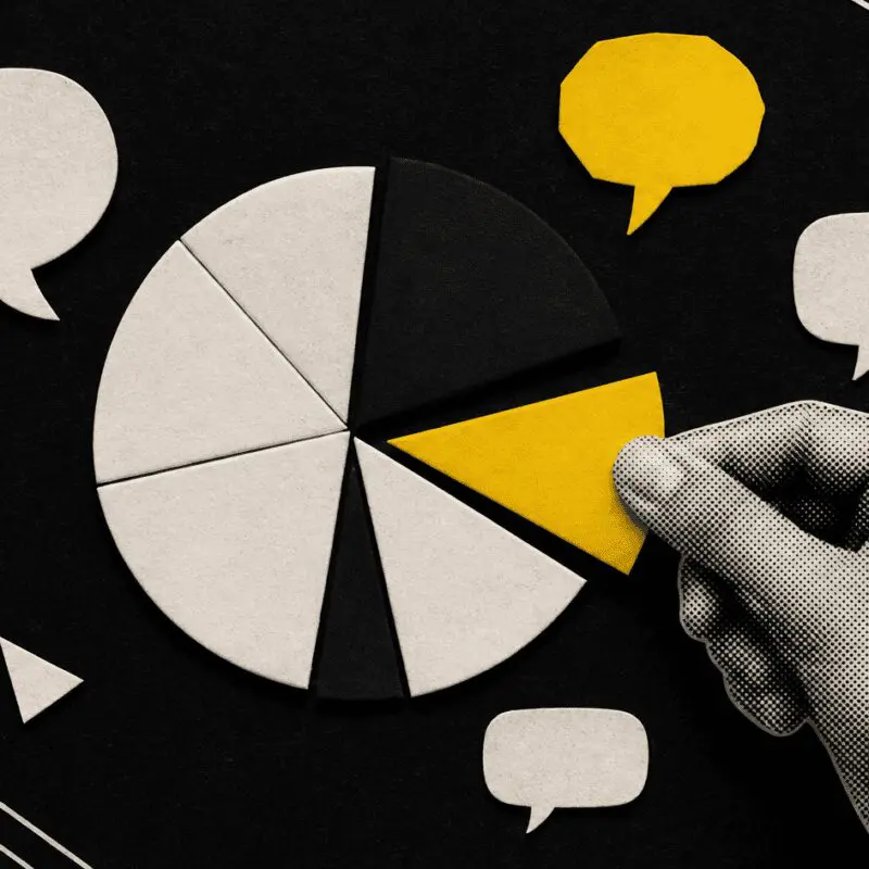 A hand pulls a yellow slice from a paper pie chart among floating speech bubbles, on black.
