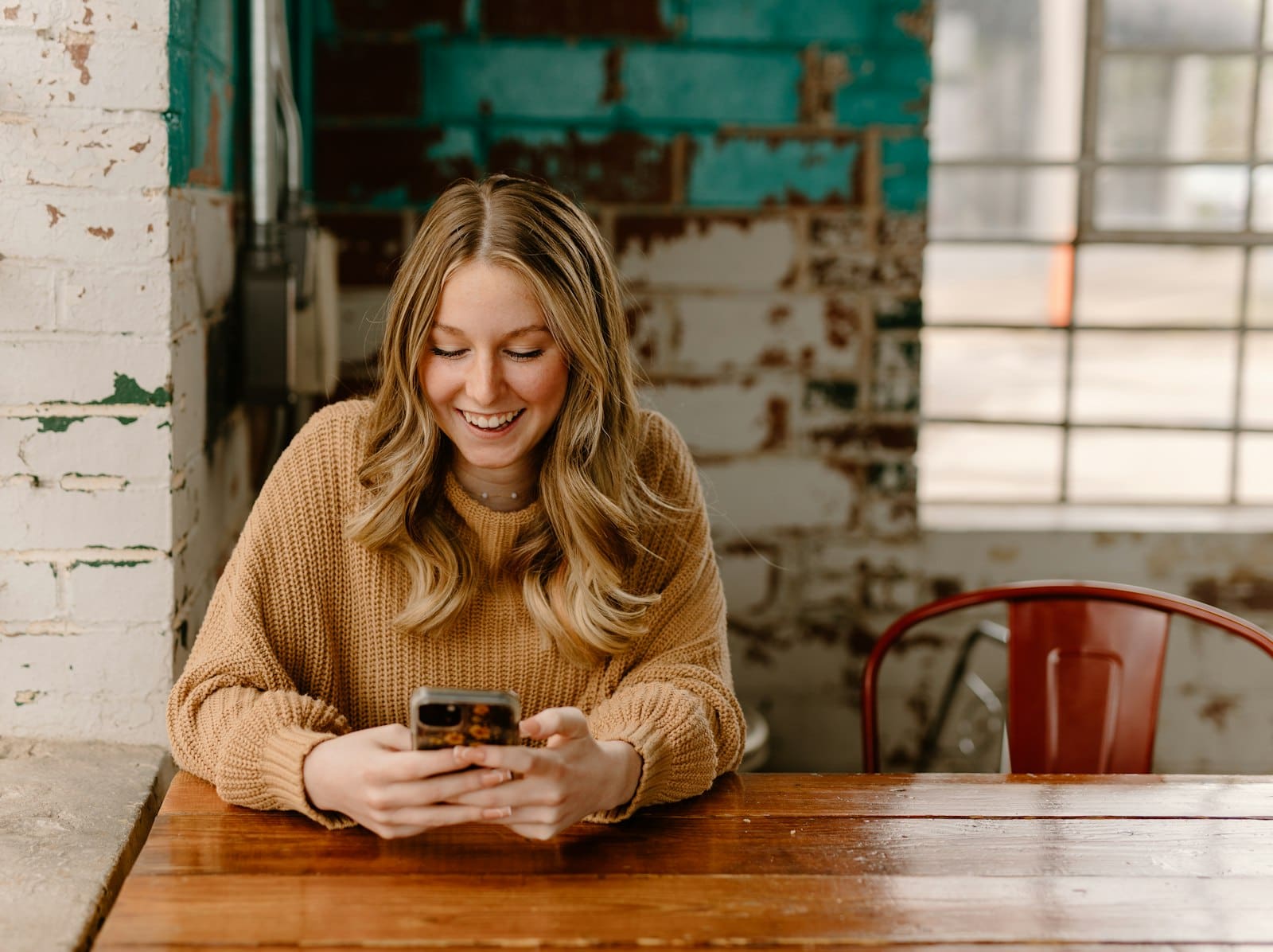 A woman asking her phone a question