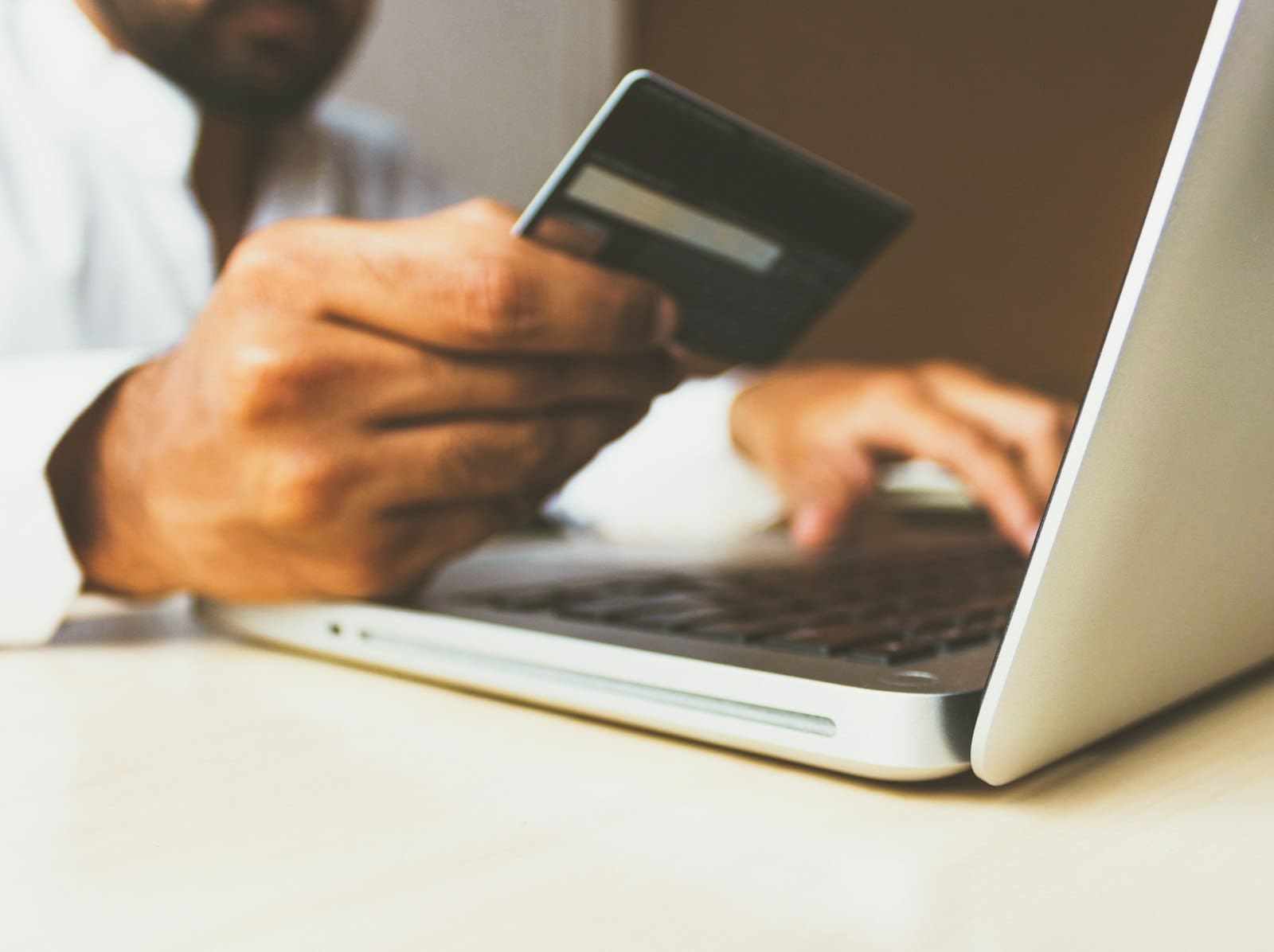 Someone paying online with a card